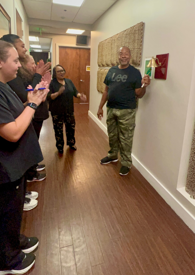 Terrance ringing the bell