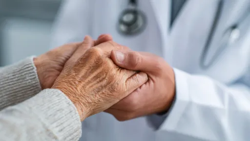 Provider holding patient's hand