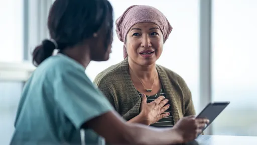 clinician consults with patient