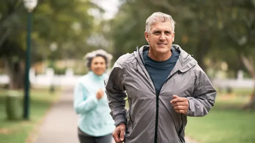 Shot of a senior couple out for a run in the park
