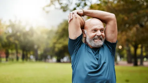 Older man stretching before exercise