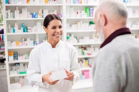 Pharmacist speaking with a patient